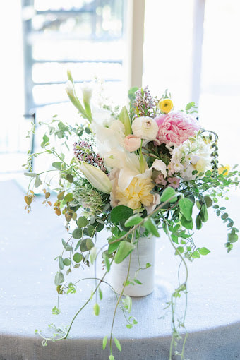 Pastel spring wedding bridal bouquet in a custom ceramic vase by District 2 Floral Studio using local and American-grown flowers.
