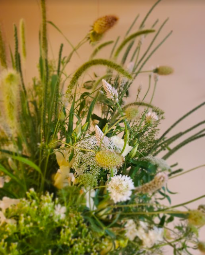 Green and white flower arrangement by District 2 Floral Studio created with locally grown flowers.